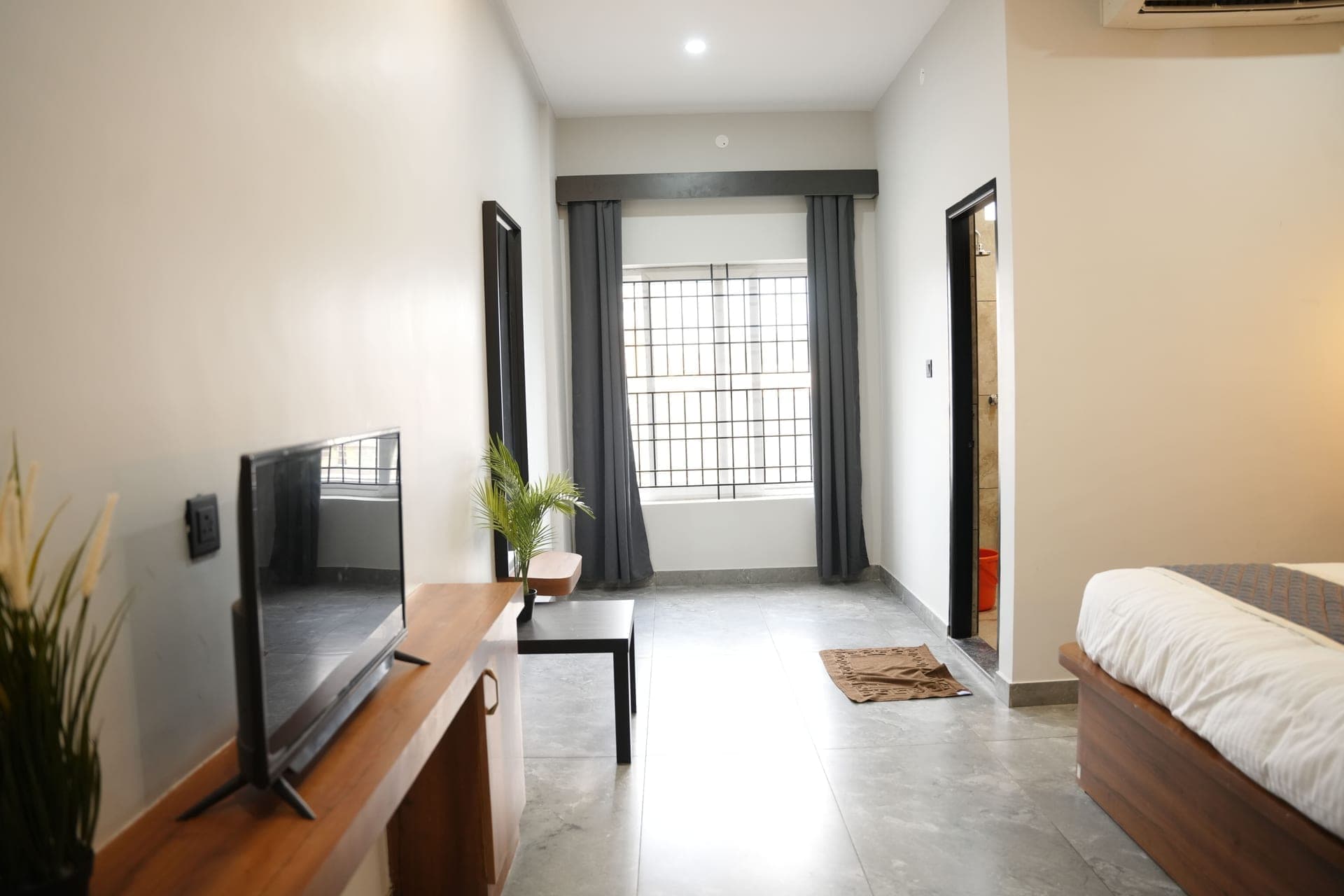 In-house vegetarian restaurant dining area at Sarvam Residency Sagara